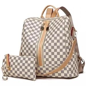 Brand New Checkered Backpack with Vegan Leather Trim, with matching wristlet.
